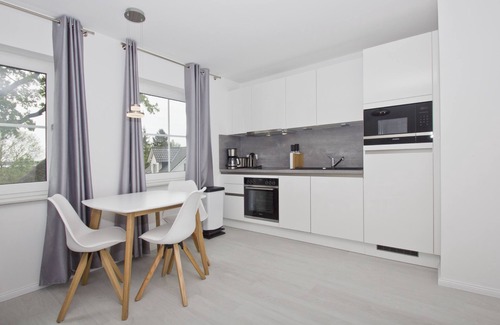 Gross Zicker Apartment | Modern vacation apartment with garden - Haus Inselwind FeWo MEERbucht