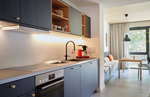 Hohwacht Apartment | Modern duplex apartment with rooftop terrace.