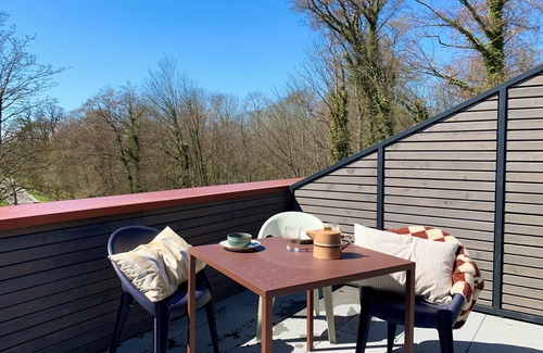 Hohwacht Apartment | Modern duplex apartment with rooftop terrace.