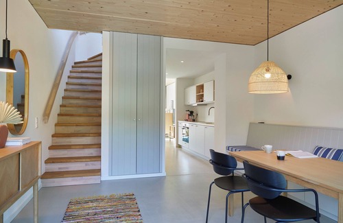 Hohwacht Apartment | Modern duplex apartment with rooftop terrace.
