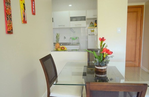 Armacao Apartment | Modern fully-furnished apartment with swimming pool, gym and game room.
