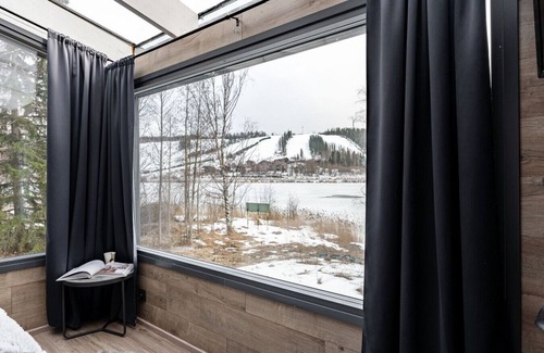Jamsa Cabin | Modern Glass Suite on Himosranta with Lake Views