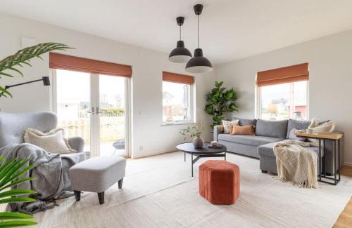 Bastad House | Modern Ground Floor Corner Flat with Rustic Patio