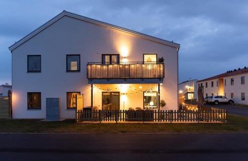 Bastad House | Modern Ground Floor Corner Flat with Rustic Patio