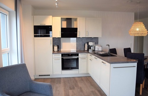 Schillig Apartment | Modern, high-quality vacation apartment, sauna, large balcony, sea view, close to the beach