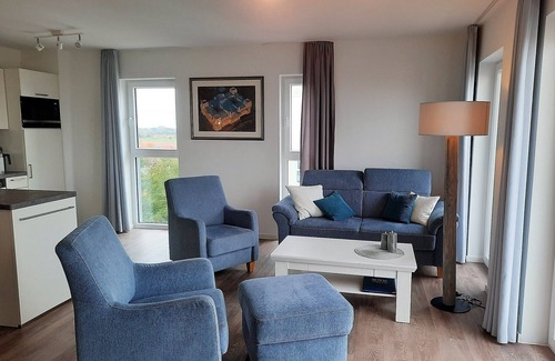 Schillig Apartment | Modern, high-quality vacation apartment, sauna, large balcony, sea view, close to the beach