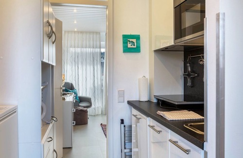 Schoenwald Apartment | Modern Holiday Apartment “Urs” with Mountain View, Balcony, Sauna & Pool