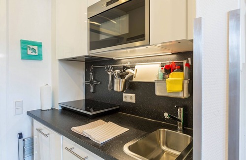 Schoenwald Apartment | Modern Holiday Apartment “Urs” with Mountain View, Balcony, Sauna & Pool