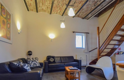 Mesch Apartment | Modern holiday home in characterful old farmhouse