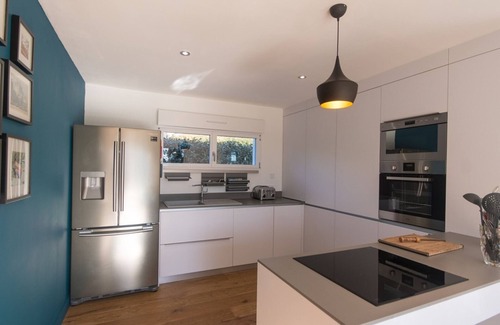 Le Palais House | Modern Home: Near Town & Beach, Sea Views, Pets OK