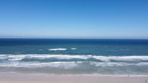 Daytona Beach Shores Apartment | Modern King Suite #12 - Steps to Beach