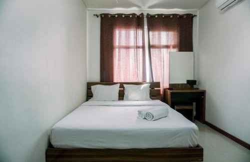 Pluit Apartment | Modern Look 1BR Green Bay Condominium Apartment By Travelio