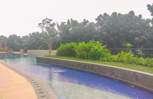 Depok Apartment | Modern Look and Homey 2BR Transpark Cibubur Apartment near Mall By Travelio