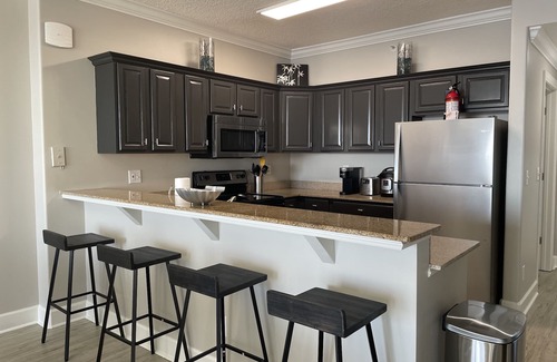 West Panama City Beach Condo | Modern Lux Beach Front unit Gulffront master & huge balcony, free beach service