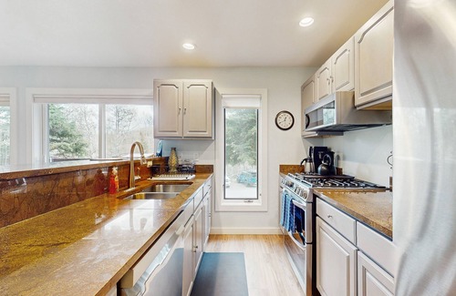 Snowmass Village Condo | Modern mountainside condo with fireplace, & W/D