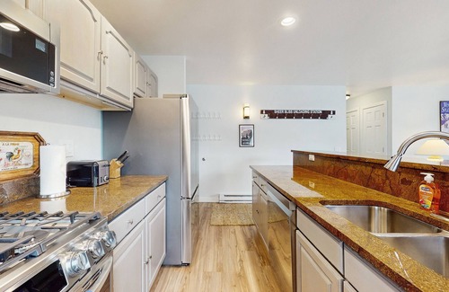 Snowmass Village Condo | Modern mountainside condo with fireplace, & W/D
