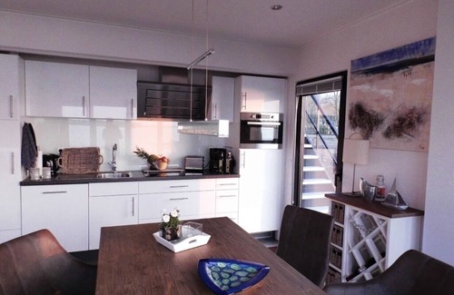 Hulshorst House | Modern new beach house - right on the water - large roof terrace/free WiFi