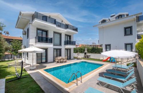 Oludeniz Villa | Modern newly built 4 bedroom villa with pool and garden in Central Hisaronu