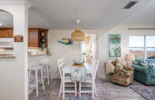 Butler Beach Condo | Modern Ocean View Condo, Just Steps from the Beach with Pool Access