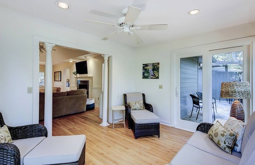 West Beach Condo | Modern, one-level condo near beach & golf with deck, sunroom, & pool