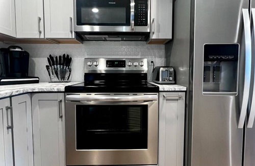 Spokane Valley Apartment | Modern, remodeled, excellent location, free parking, large fenced yard,