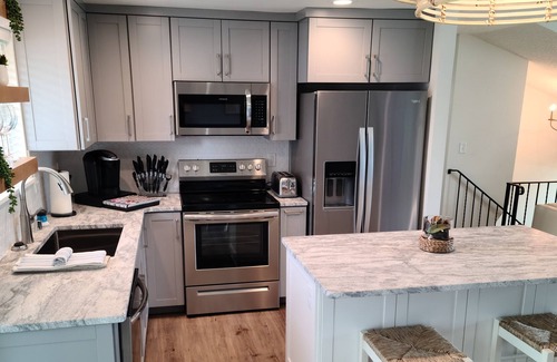 Spokane Valley Apartment | Modern, remodeled, excellent location, free parking, large fenced yard,