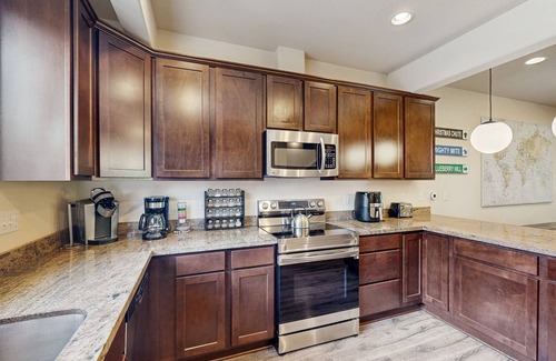 Alyeska House | Modern riverfront condo with hot tub, entertainment & river views
