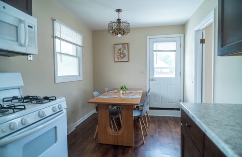 Mundelein Apartment | Modern Rooftop Retreat in Downtown Mundelein