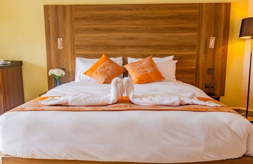 Langata Bed & Breakfast | Modern Room in Karen Plains Hotel, Nairobi , with Balcony and Workspace