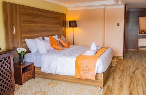 Langata Bed & Breakfast | Modern Room in Karen Plains Hotel, Nairobi , with Balcony and Workspace