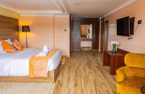 Langata Bed & Breakfast | Modern Room in Karen Plains Hotel, Nairobi , with Balcony and Workspace