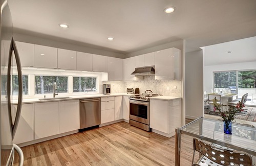 Springs House | Modern & Spacious, Heated Pool, Gas Grill, Wine Cellar. Bike To Sandy Beaches!