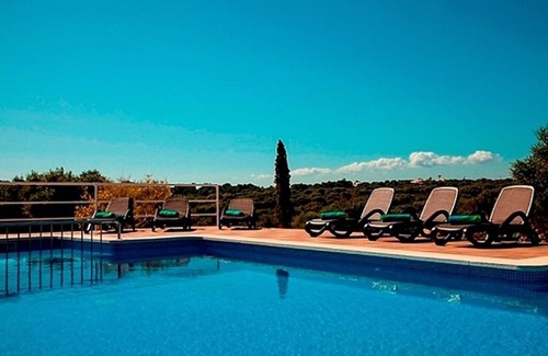 Sant Lluis Villa | Modern, spacious, private, views of olive groves and sunset from pool house