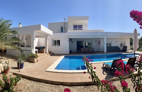 Sant Lluis Villa | Modern, spacious, private, views of olive groves and sunset from pool house