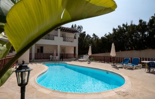 Peyia Town Apartment | Modern Studio with Pool and Balcony Hillside and Sea Views