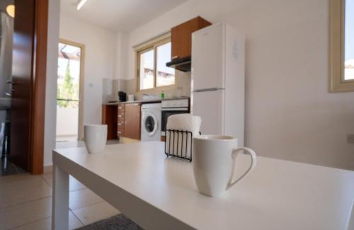 Peyia Town Apartment | Modern Studio with Pool and Balcony Hillside and Sea Views