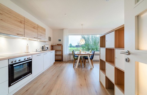 Greetsiel Apartment | Modern "Stuuv" vacation apartment with a view of the Greetsiel twin mills