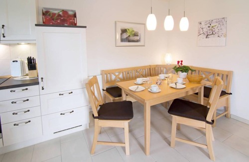 Dornumersiel Apartment | Modern upper apartment Annegret on the canal