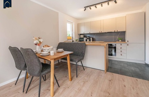 Koelpinsee Apartment | Modern vacation apartment close to the beach & family-friendly with balcony, including local