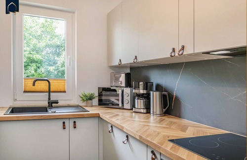 Koelpinsee Apartment | Modern vacation apartment close to the beach & family-friendly with balcony, including local