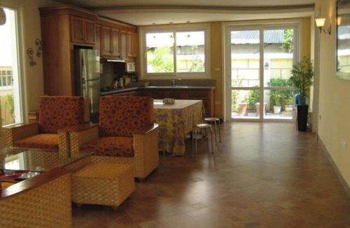 Tay Ho House | Modern Western breezy tropical villa by Red River and West Lake, Hanoi.