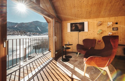 Gatschach Ski Chalet | Modern wooden chalet directly on Lake Weissensee in Carinthia incl. beach and SEE-Spa!