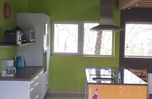 Luzech House | Modern wooden house with tree terrace and private heated pool