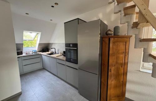 Norsingen Apartment | Modernes Loft am Rebberg im historischen Winzerhof