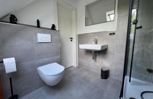 Norsingen Apartment | Modernes Loft am Rebberg im historischen Winzerhof