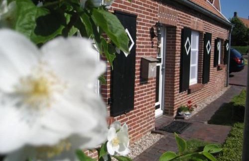 Rysum House | Modernisiertes und hell eingerichtetes Ferienhaus mit eigenem Garten ideal für Familien