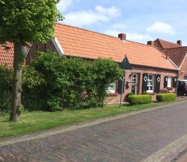 Rysum House | Modernisiertes und hell eingerichtetes Ferienhaus mit eigenem Garten ideal für Familien
