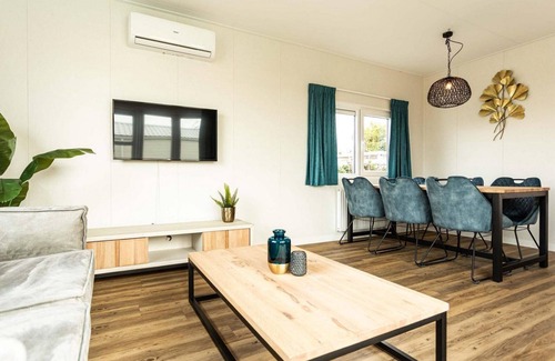 Berkhout Ski Chalet | ✓ Module Flat Roof at Park Westerkogge ✓ Holiday home for 4 people ✓ Located in Berkhout (North Holland) ✓ Waterfront holiday resort ✓ Book directly at the resort