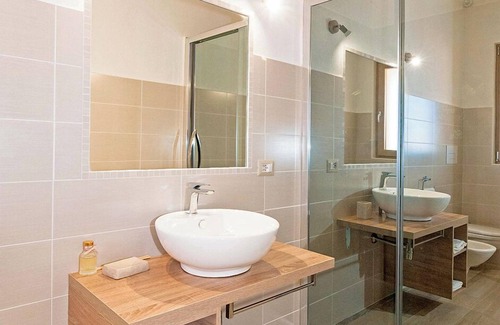 San Teodoro House | MOLAROTTO CAMERE CON ANGOLO COTTURA
