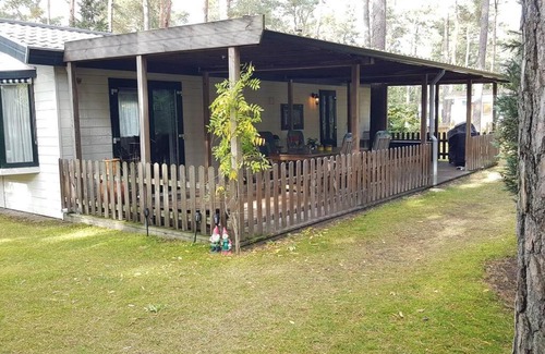 Doornspijk Apartment | Mooi chalet met grote tuin op een 4 sterren park.